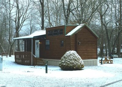 camping cabin in snow